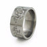 Liung Titanium ring with an Asian spin. Beautiful, ornate serpentine dragons are carved around the surface,