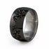 Liung Black Titanium ring with an Asian spin. Beautiful, ornate serpentine dragons are carved around the surface,
