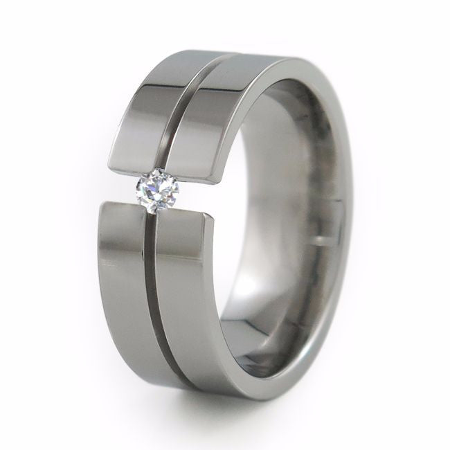 Titanium Wedding band with tension set diamond solitaire