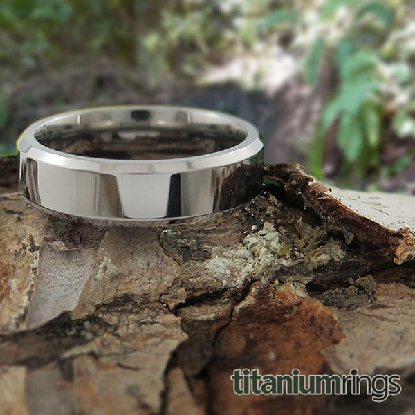 Mens titanium wedding band with beveled edges and custom fit. Pure titanium