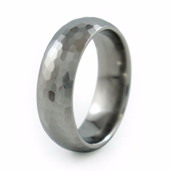 This gently domed Crater Titanium ring was further enhanced with an antiqued, hammered texture. The bumpy surface is rugged yet elegant and provides a smooth, comfortable feel.