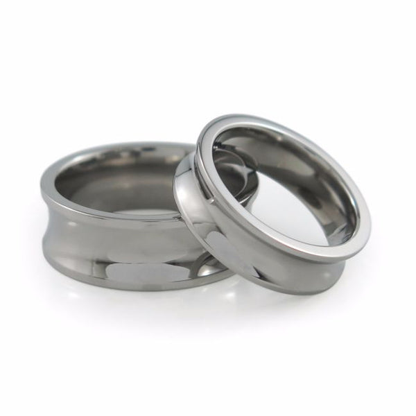 Ladies titanium ring featuring a concave, inverted dome profile.