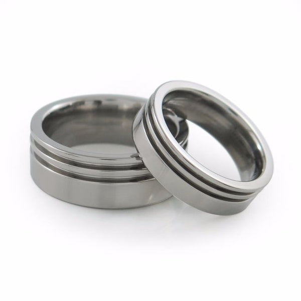 flat profiled Titanium ring with offset dual grooves for a contemporary, sporty flair. 