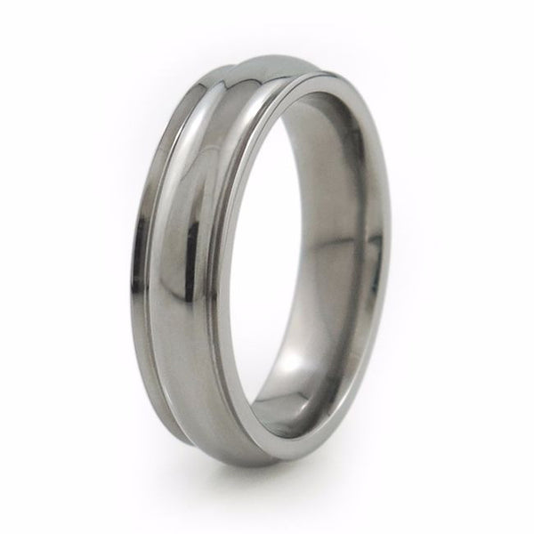 Ladies titanium ring urvy dome center is adorned by two wing-like, slanted edges and has an airy feel. I