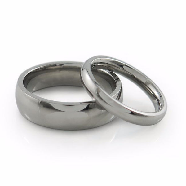 ladies titanium ring featuring a simple dome profile with a gentler slope. Its 
