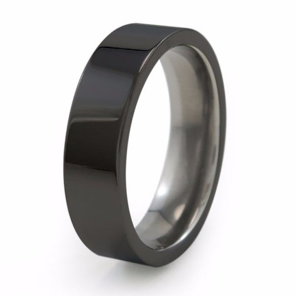 A traditional Titanium wedding ring with black diamond coating. Men's ring and Women's ring