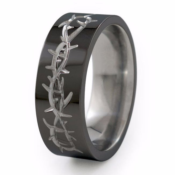 Titanium Ring with a barbed wire design neatly carved into the surface giving the Taboo Titanium ring a cool, rebel-like appeal.