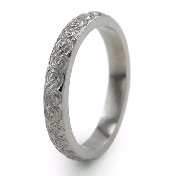 Titanium Ring with delicate carving gives the ring a vintage appeal.