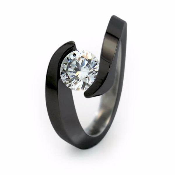 The Stella Titanium engagement ring is elegant and trendy. Your Diamond or gemstone appears to float in a flowing wave. 