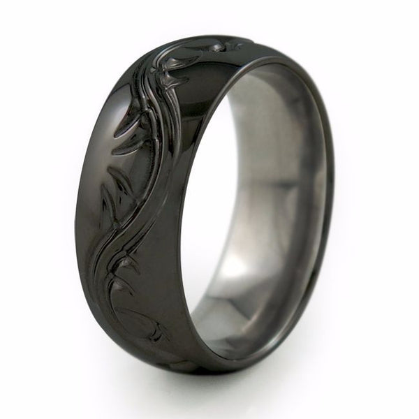 Black titanium ring with elegant serpentine design that is often seen in tattoos. 
