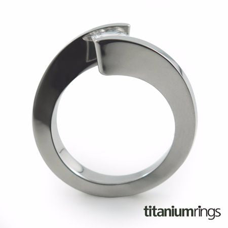 The Etoile Titanium engagement ring is clean and crisp in appearance. Your Gemstone sits flawlessly and appears to float