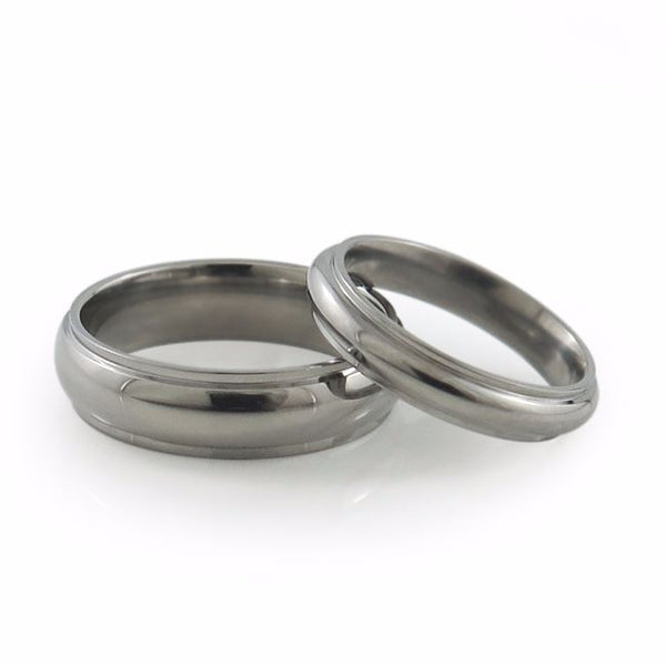 Ladies Titanium Ring great classic design further enhanced by two linear, squared edge-cuts for added style. 