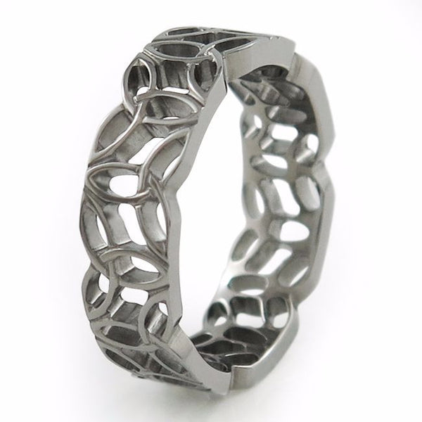 This one-of-a-kind ring incorporates a complex Triquetra knot pattern.