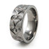 Titanium Ring adorned with heart etchings and engravings around the band. 