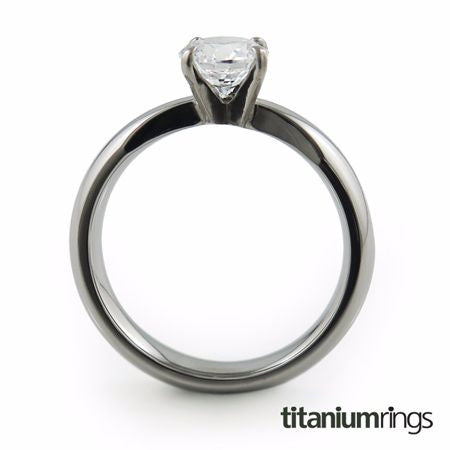  classic solitaire Titanium ring, featuring a dome profile band adorned with a beautiful gem. 