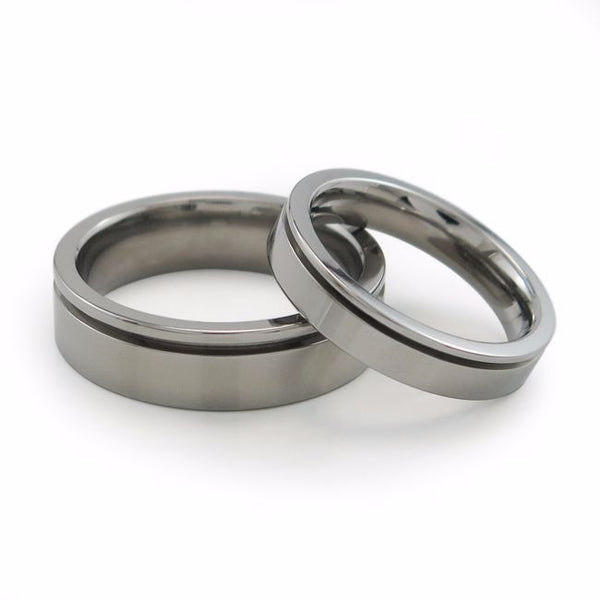 Mens titanium wedding band with inset grove. Mens titanium ring can be anodized with color. Comfort fit ring
