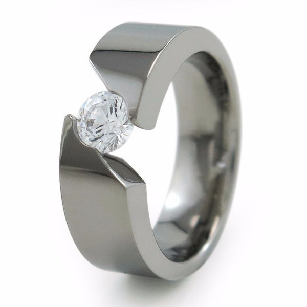 Beautiful titanium engagement ring is a bold ring that lifts up your chosen Diamond or gemstone to accentuate it’s glimmer. 
