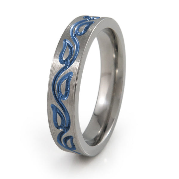 The Vineleaves titanium ring features a dainty and feminine vine leaf carving all around the ring. This titanium ring can be further personalized with your preferred color accent and finish