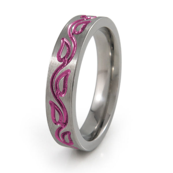 The Vineleaves titanium ring features a dainty and feminine vine leaf carving all around the ring. This titanium ring can be further personalized with your preferred color accent and finish